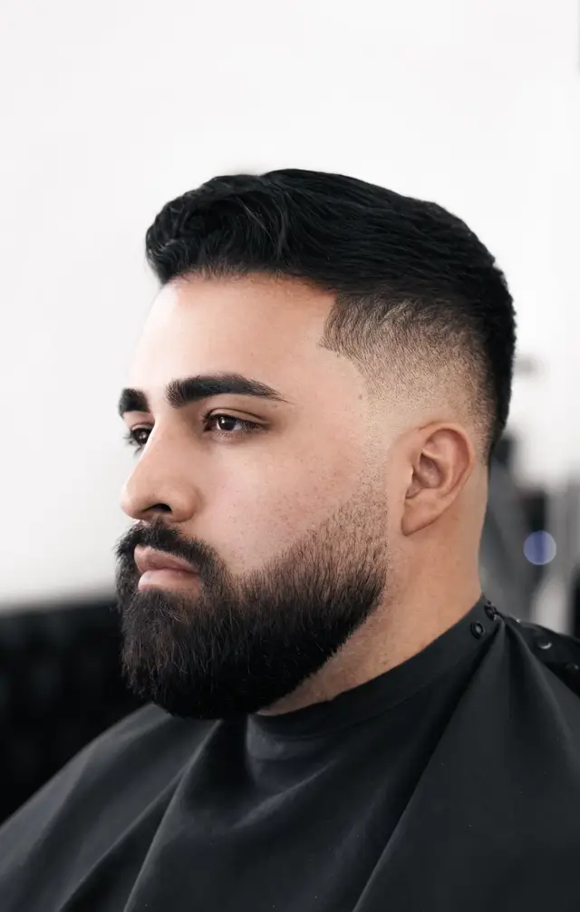 Low skin fade with full beard by Mike Prosch, Palm Springs barber